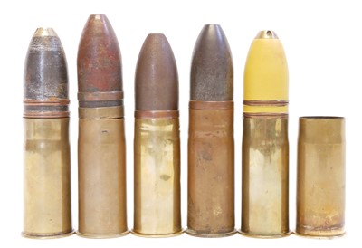 Lot 137 - Five inert WWI 37mm shells and one case