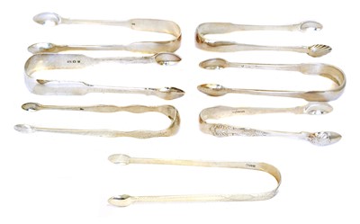 Lot 203 - A selection of George III and later silver sugar tongs