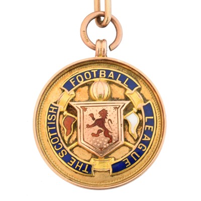 Lot 58 - An early 20th century 9ct gold enamel football medallion