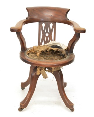 Lot 381 - Early 20th-century mahogany office chair