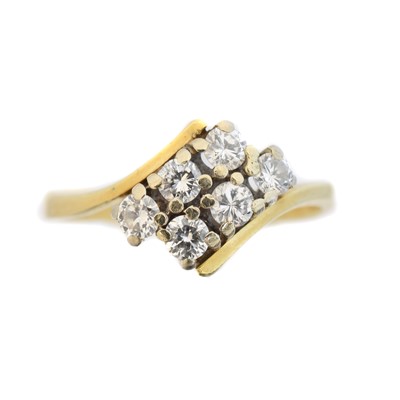 Lot 146 - A diamond crossover ring