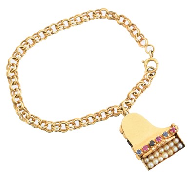 Lot 30 - A mid 20th century charm bracelet