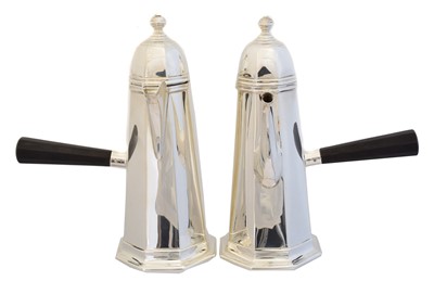 Lot 128 - A pair of George V silver chocolate pots
