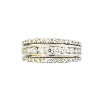 Lot 110 - An 18ct gold diamond band ring
