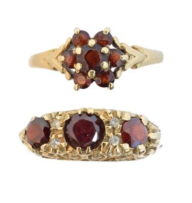 Lot 68 - Two 9ct gold garnet dress rings