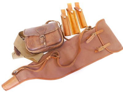 Lot 226 - Leather cartridge bag, canvas and leather slip and three bolt holsters