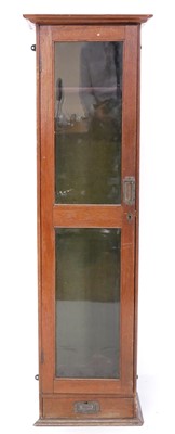 Lot 223 - Oak gun cabinet