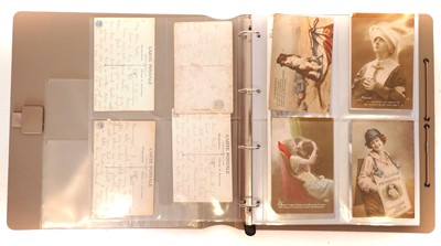 Lot 391 - WWI era postcards two button polishers and a trench art letter opener.