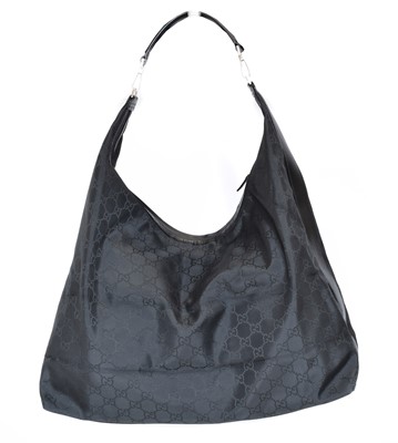 Lot 8 - A Gucci Extra Large Travel Hobo Bag