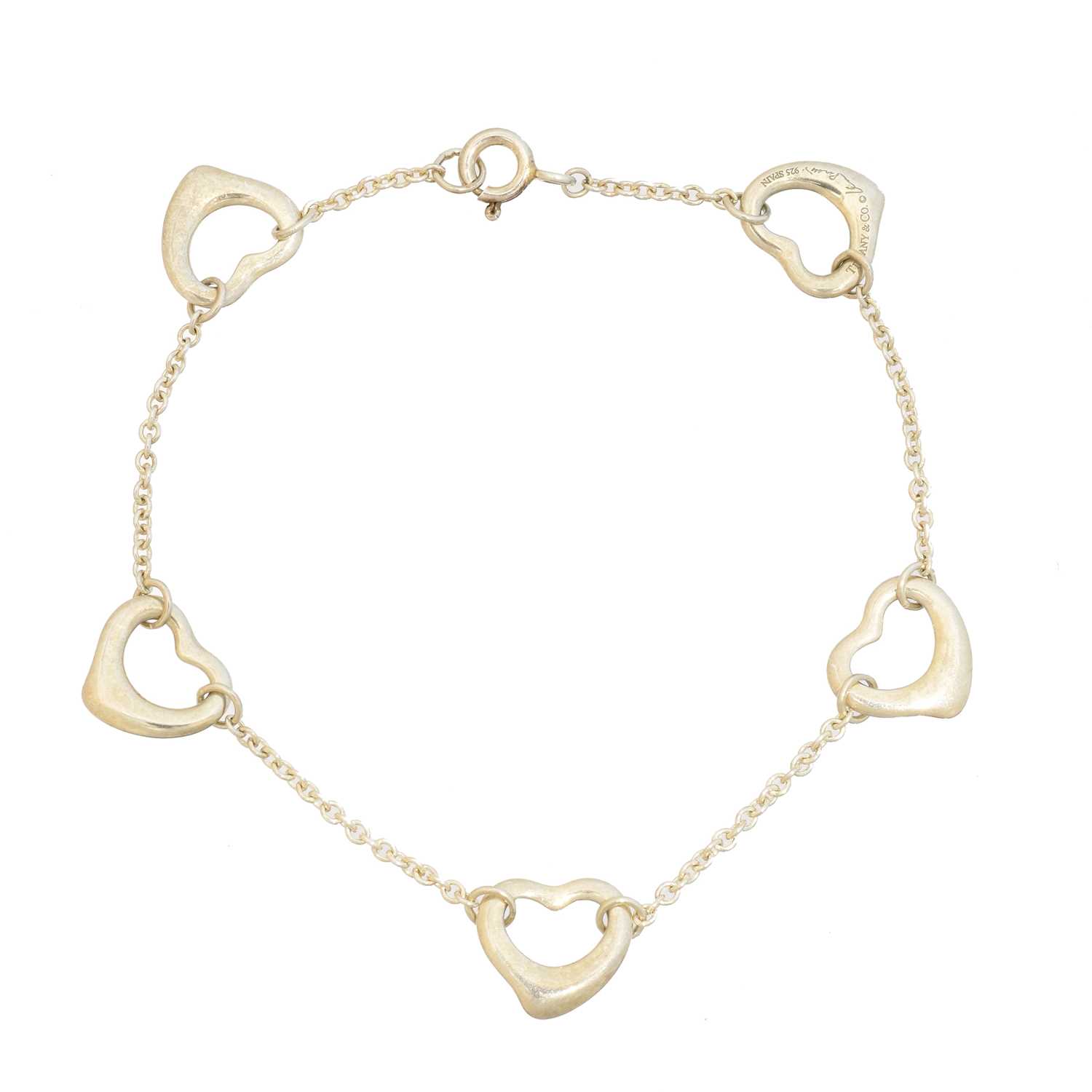 Lot 24 - An 'Open Heart' bracelet by Elsa Peretti for Tiffany & Co.