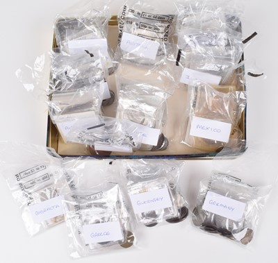 Lot 57 - Tin of assorted foreign coinage to include many silver coins from Germany, France, Australia etc.
