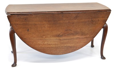 Lot 302 - George II mahogany drop-leaf dining table