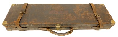 Lot 220 - Leather and brass shotgun case