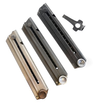 Lot 227 - Three Luger magazines and a reloading / stripping tool