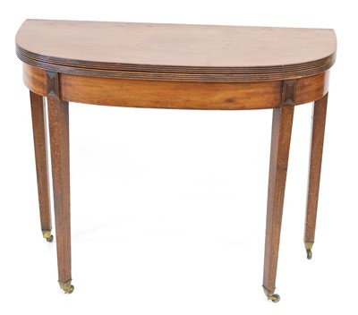 Lot 313 - Early 19th-century mahogany fold-over tea table