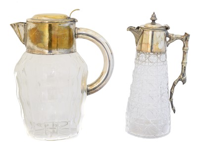 Lot 144 - Two EPNS claret jugs