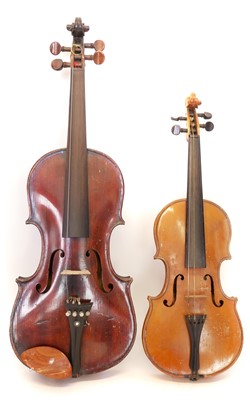 Lot 225 - 4/4 violin and a 1/2 size violin, each with a bow and case.