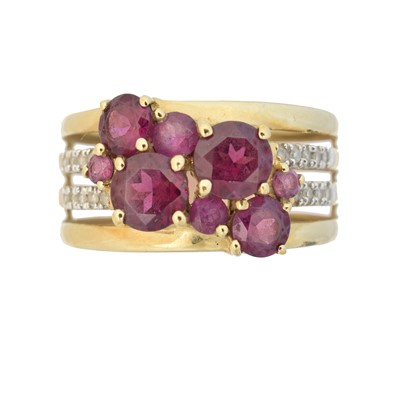 Lot 57 - A 9ct gold garnet and diamond dress ring