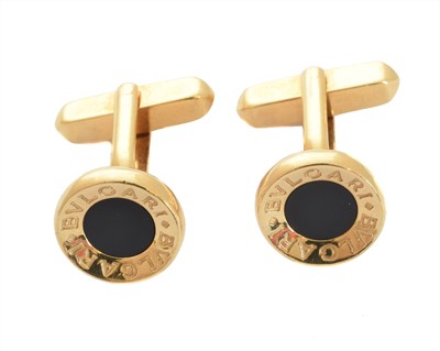 Lot 165 - A pair of 18ct gold onyx cufflinks by Bulgari
