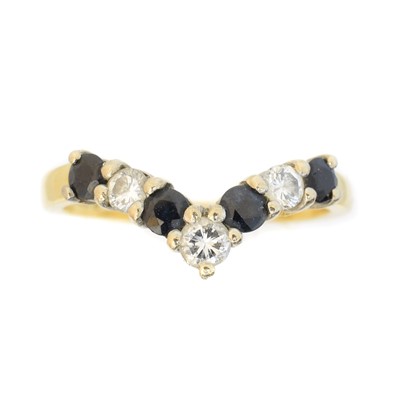 Lot 41 - An 18ct gold sapphire and diamond band ring