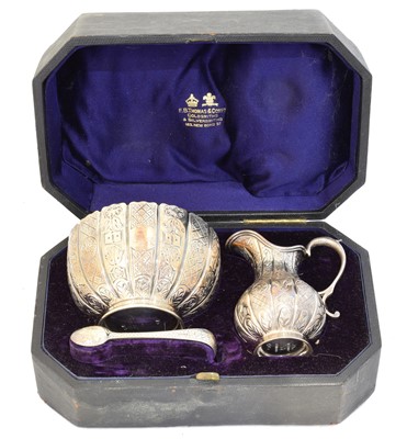 Lot 135 - A Victorian silver jug, bowl and tongs