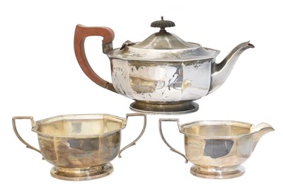Lot 156 - A George VI silver three piece teaset