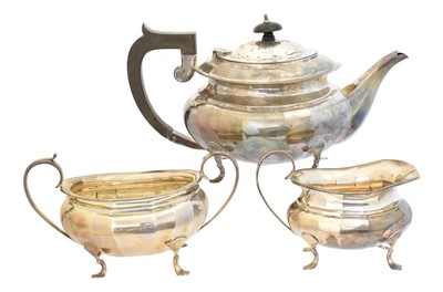 Lot 157 - A George V silver three piece teaset