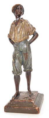 Lot 108 - Painted terracotta figure of a black child