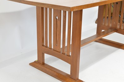 Lot 273 - Liberty Guild arts & crafts oak dining table and chairs