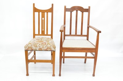 Lot 273 - Liberty Guild arts & crafts oak dining table and chairs
