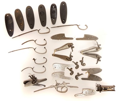 Lot 239 - Collection of gun locks and butt plates.