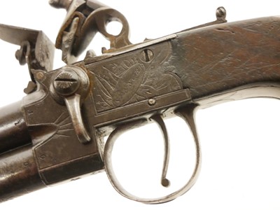 Lot 2 - Flintlock over and under pocket pistol by Spencer of London.