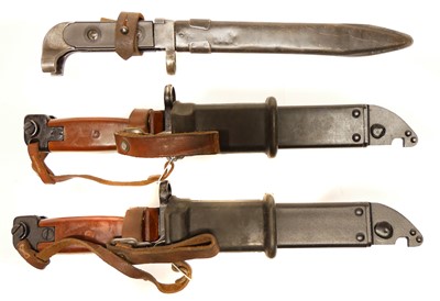 Lot 310 - Three AKM / AK47 bayonets and scabbards