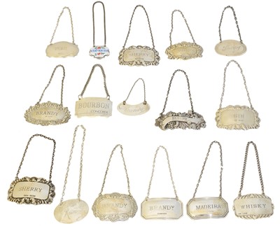 Lot 151 - A selection of silver spirit labels