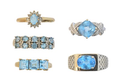 Lot 159 - Five 9ct gold blue topaz dress rings