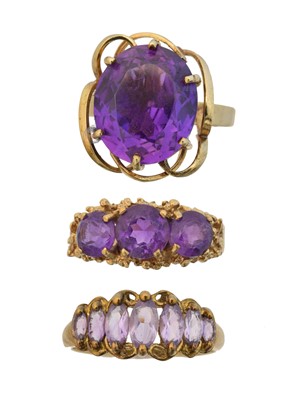 Lot 132 - Three 9ct gold amethyst dress rings