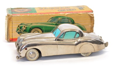 Lot 196 - German Prameta Chrome clockwork Jaguar XK120