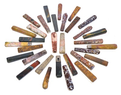 Lot 269 - A collection of hardstone cutlery handles.