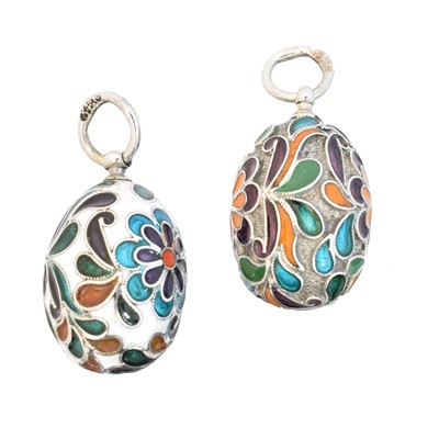 Lot 22 - Two silver enamel egg pendants
