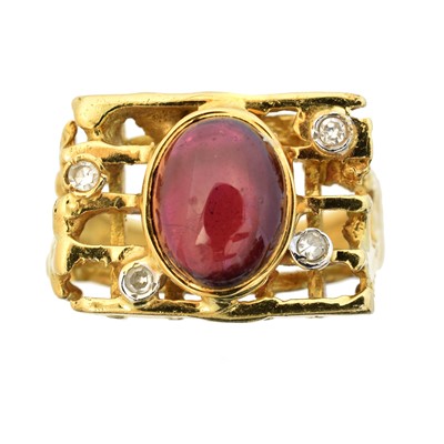 Lot 120 - A 1960s garnet and diamond dress ring by George Weil