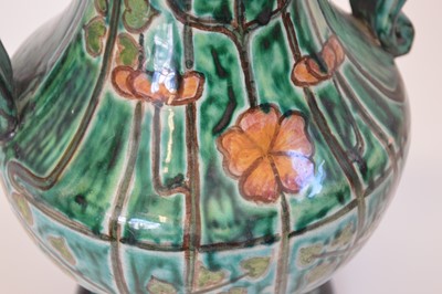 Lot 70 - Della Robbia twin handled footed vase