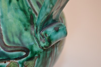 Lot 70 - Della Robbia twin handled footed vase