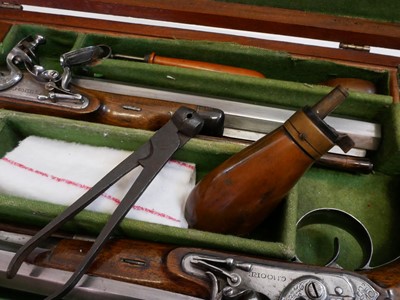Lot 2 - Pair of flintlock pistols by Moore