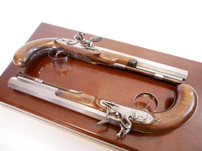 Lot 2 - Pair of flintlock pistols by Moore
