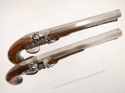 Lot 2 - Pair of flintlock pistols by Moore
