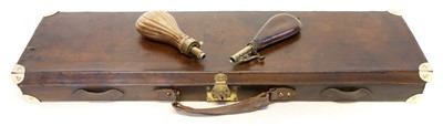 Lot 255 - Leather shotgun case, powder flask and shot flask.