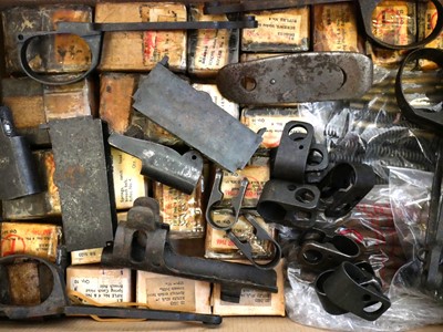 Lot 269 - Collection of Lee Enfield SMLE rifle spare parts, some in the original packing boxes.