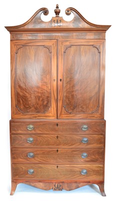 Lot 317 - Mid 19th century continental mahogany linen press on chest