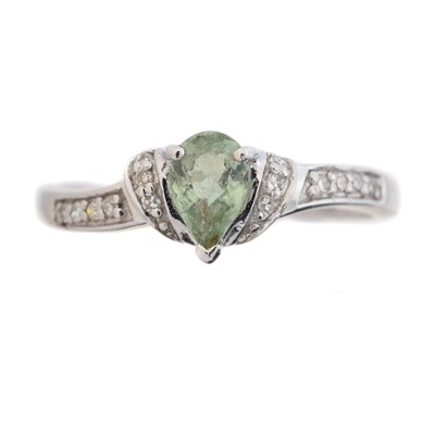 Lot 166 - An 18ct gold tourmaline and diamond dress ring