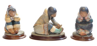 Lot 102 - Three Lladro Eskimo figures